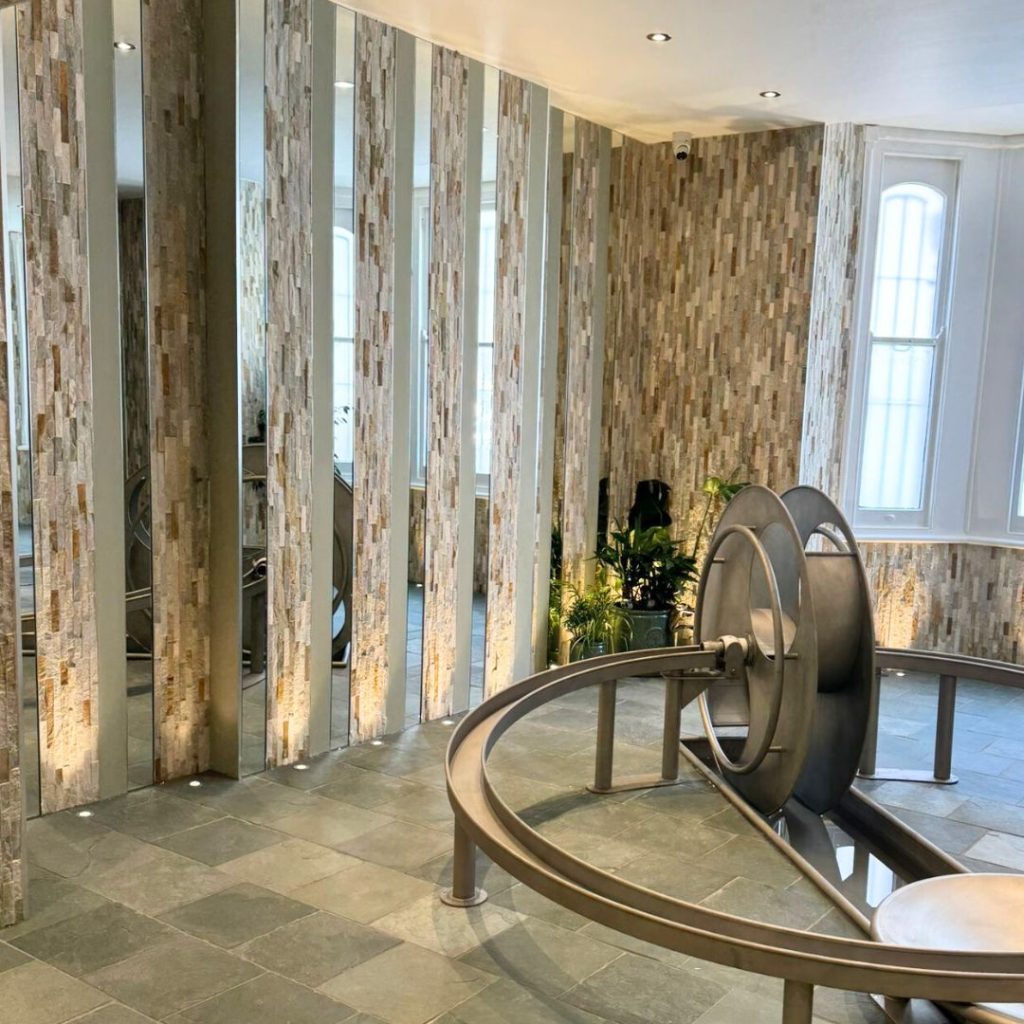 Slate floor and bespoke tile water play area in Northcote Montessori 