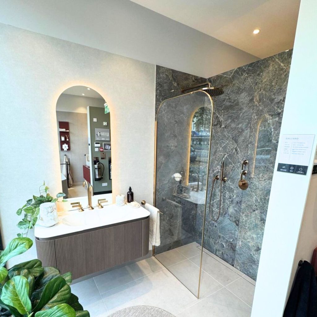 Marble tiles shower room in a commercial bathroom supplier showroom. 